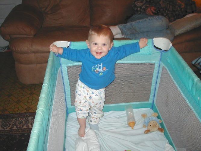 Blaise standing in playpen 11-29-05_001